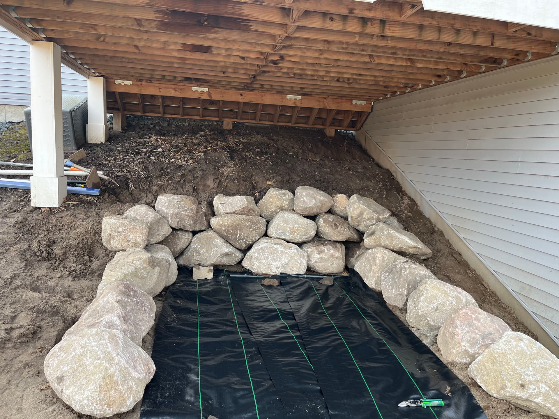 Gallery photos for Boulder Wall Installation Under the Deck in Ham Lake: Image #3