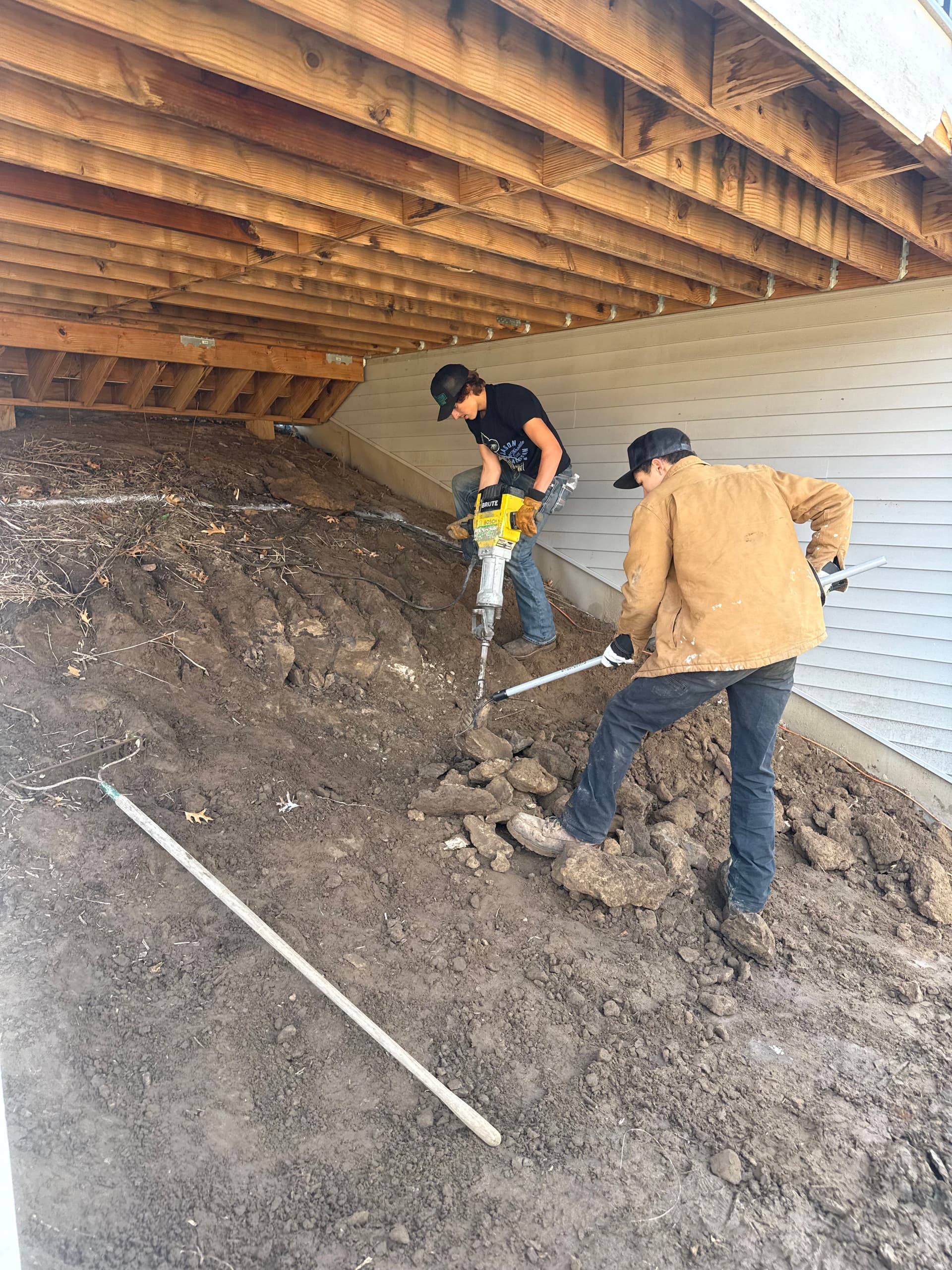 Boulder Wall Installation Under the Deck in Ham Lake